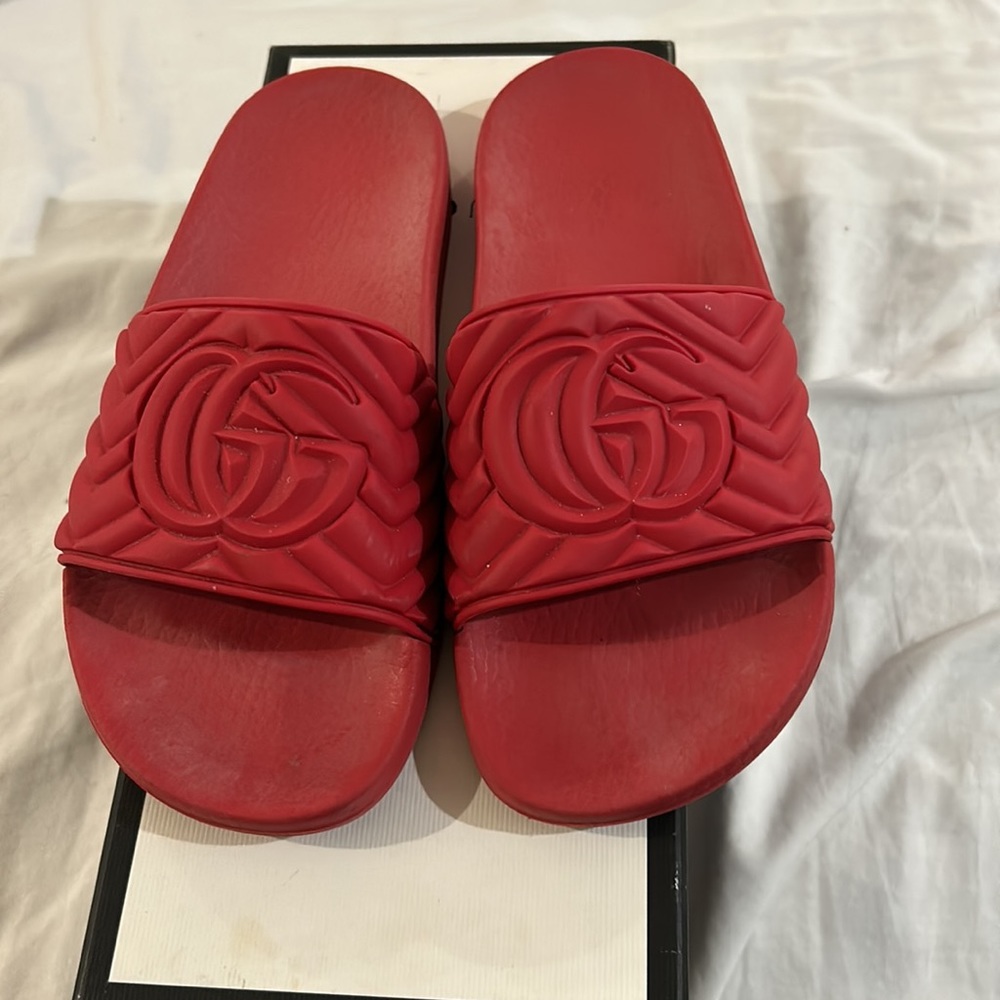 Red Gucci slides